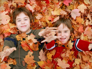 Brothers both go to the same children's dental center to have their baby teeth cleaned.