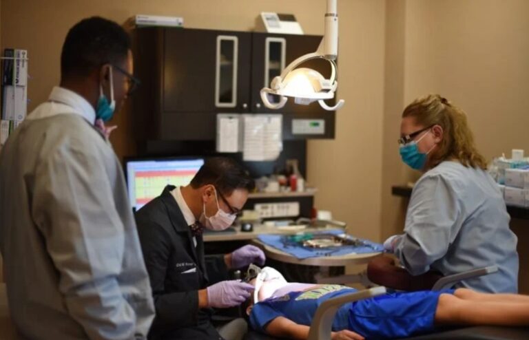 Dr. Eric Soper examining a pediatric dentistry patient in Kentucky.